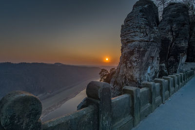 Scenic view of mountains against sky during sunset