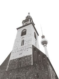 Low angle view of bell tower against sky