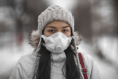 Portrait of young woman in winter