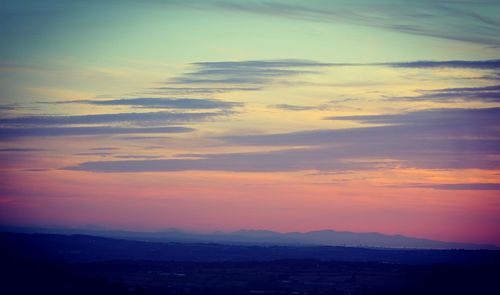 Scenic view of dramatic sky during sunset