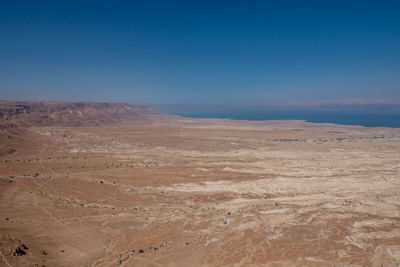 Scenic view of desert against clear sky