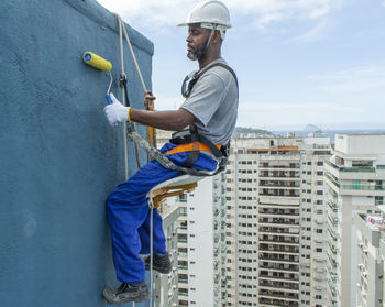 Low angle view of man standing on steps