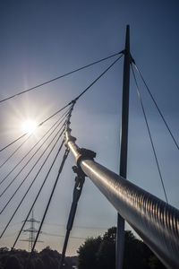 Low angle view of bridge against sky during sunset