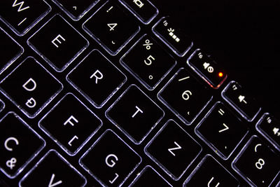 Close-up of illuminated laptop keyboard