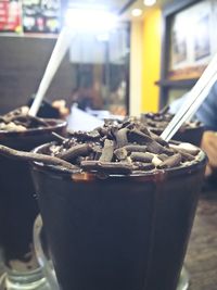 Close-up of coffee cup on table