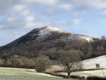 Scenic view of snowcapped mountain against sky