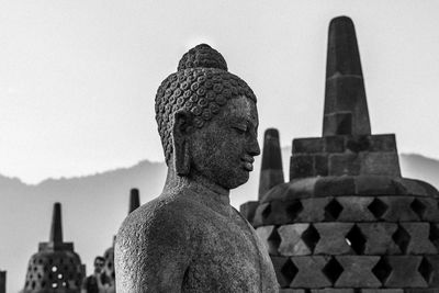 Statue of temple against sky