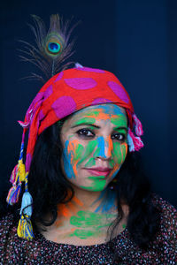 A young girl celebrating the festival of colours, holi.