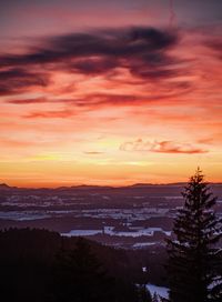Scenic view of silhouette landscape against romantic sky at sunset