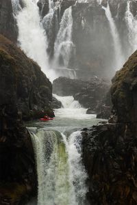 Scenic view of waterfall in forest