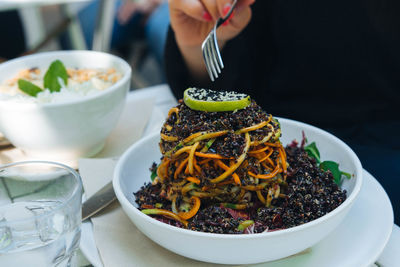 Close-up of woman eating food