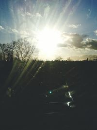 Sun shining through clouds