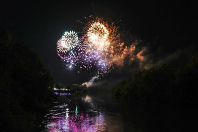 Firework display at night