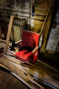 Empty chairs and table in abandoned room