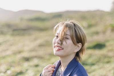 Close-up of young woman outdoors