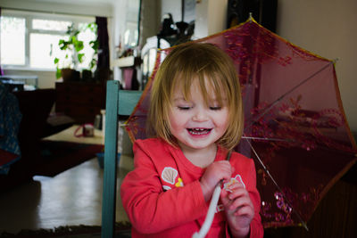 Portrait of smiling girl at home