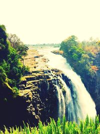 Scenic view of river against clear sky