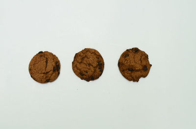 Close-up of cookies against white background