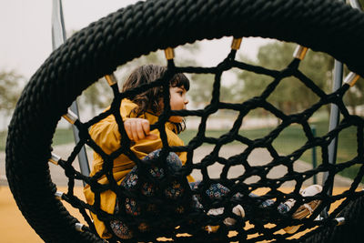 Cute girl playing on playground