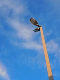 Low angle view of wind turbine against sky