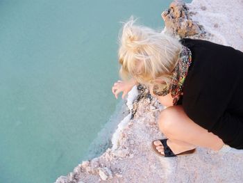 High angle view of woman by salt lake