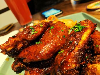 Close-up of served meat in plate