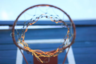 Close-up of ropes against blue sky