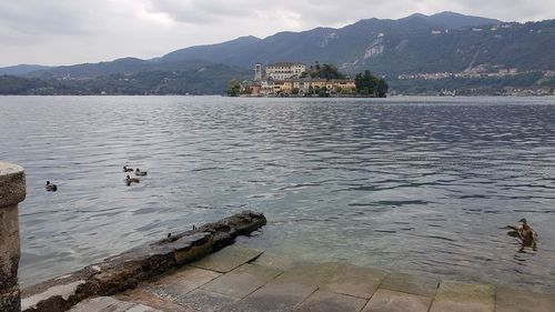 View of lake with mountain range in background