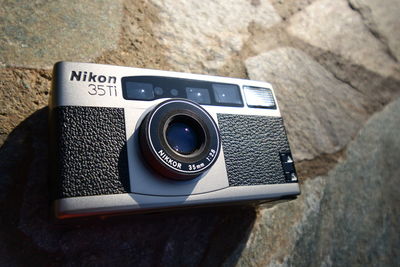 Close-up of camera on rock