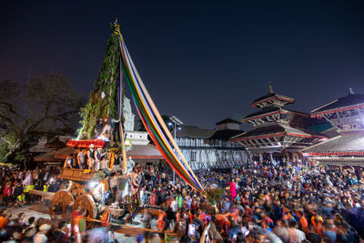 Devotees pulling a chariot during the 'seto machindranath' chariot festival in kathmandu.