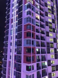 Low angle view of illuminated building at night