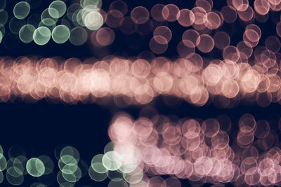 Abstract vintage bokeh lights. glitter vintage lights background. city night light blur 
