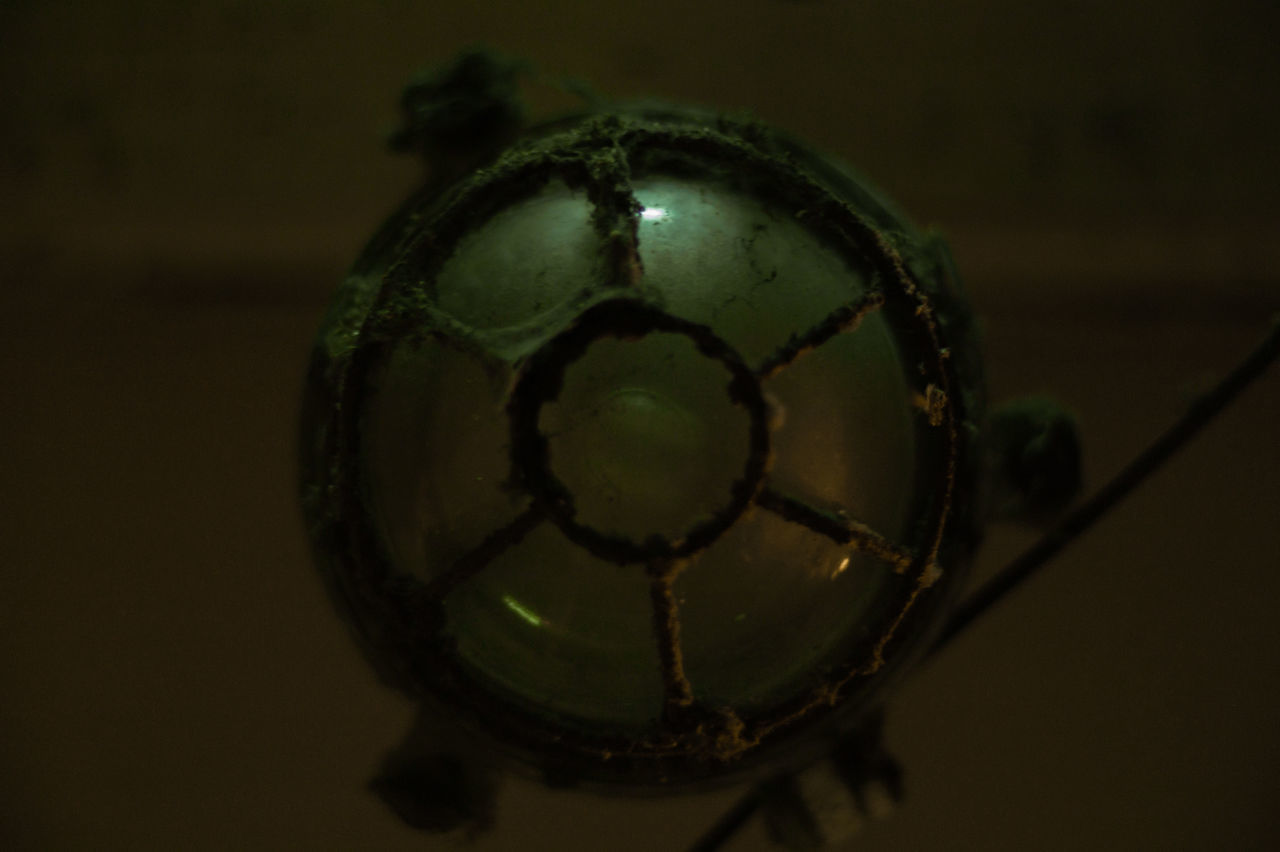 CLOSE-UP OF CRYSTAL BALL ON TABLE
