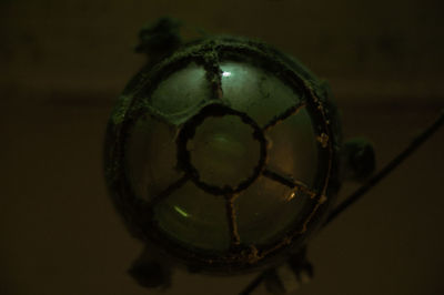 Close-up of glass ball on table