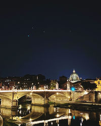 Illuminated buildings in city at night