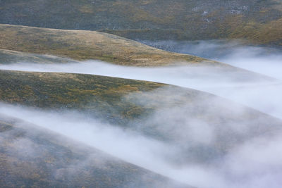 Scenic view of steam over mountain