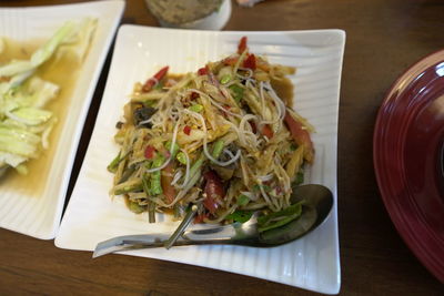 High angle view of meal served on table