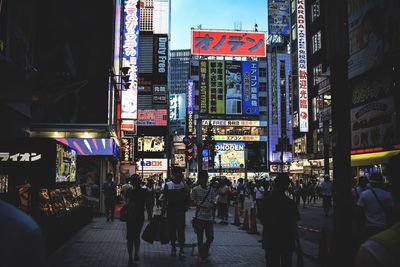 People walking on city street