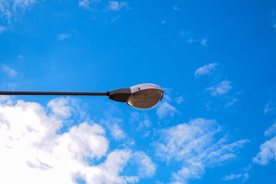 Low angle view of street light against sky