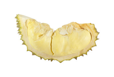 Close-up of lemon slice against white background