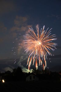 Firework display at night
