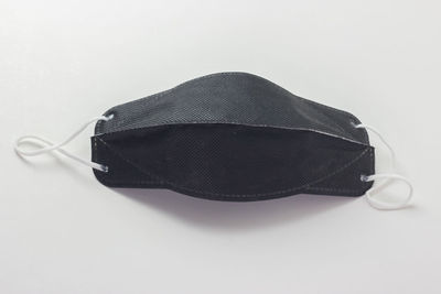 High angle view of hat against white background