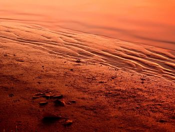 Aerial view of desert land during sunset