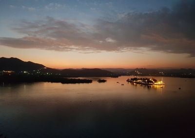 Scenic view of sea against sky at sunset