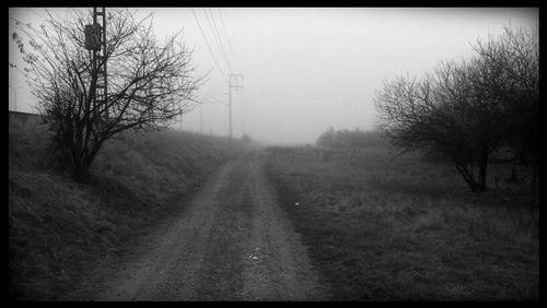 Road passing through field