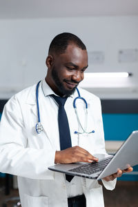 Young man using laptop