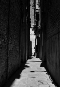 Narrow alley amidst buildings