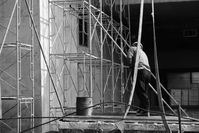 Worker standing at construction site