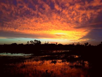 Scenic view of dramatic sky during sunset