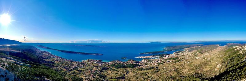 Scenic view of sea against blue sky